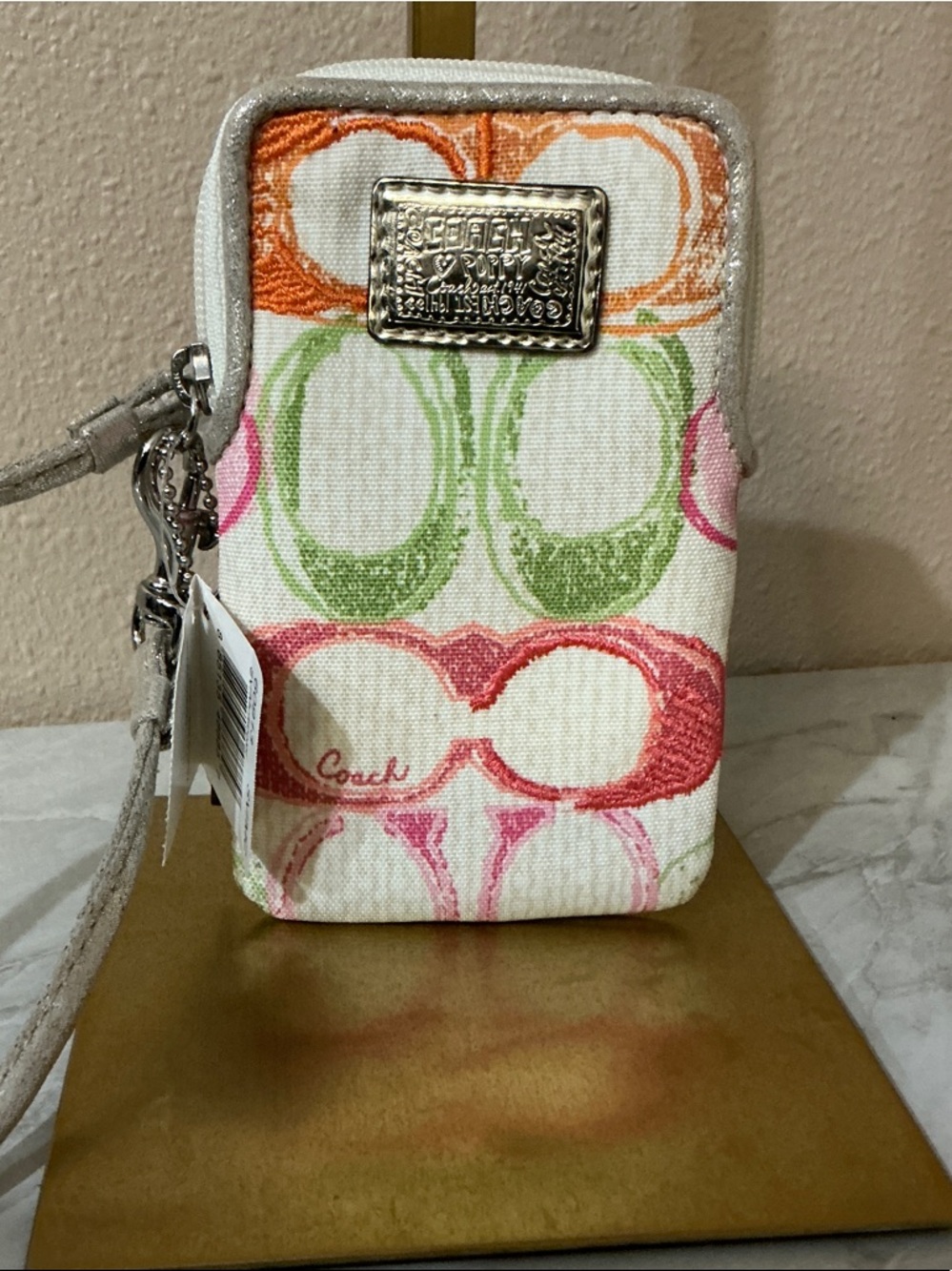 Coach Poppy Signature C Canvas wristlet wallet in the multicolor design. NWTs
